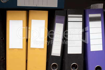 Folders on a shelf