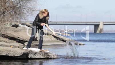 woman plays with water.