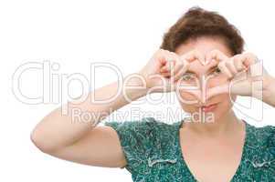 Woman with heart sign