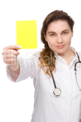 Doctor with yellow card