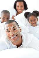 Attractive man having fun with his family