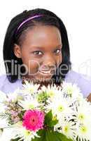 Cute young woman holding flowers