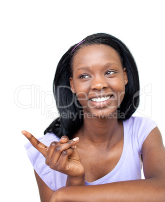Smiling young woman pointing