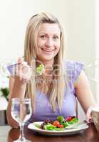 Cute woman having an healthy dinner