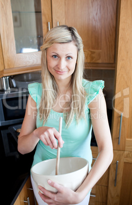 Smiling young woman cooking