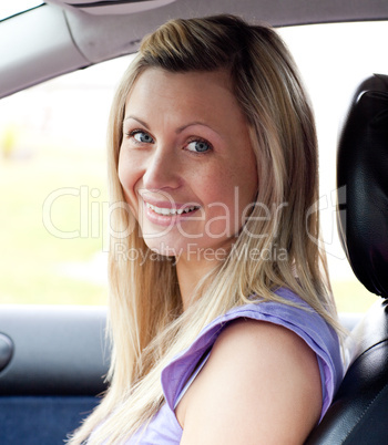 Portrait of a smiling young female driver