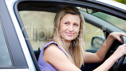 Chaming female driver at the wheel