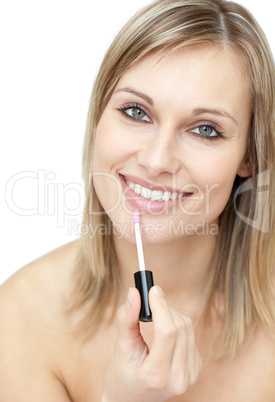 Charming woman putting gloss