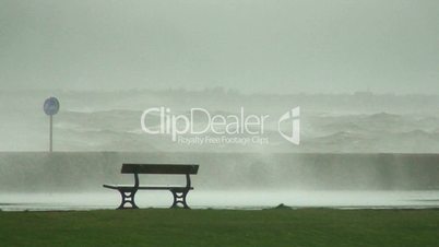 Huge waves breaking over sea wall 1