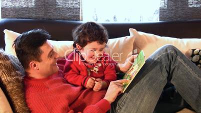Dad Reading to Son