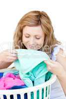 Charming woman doing laundry