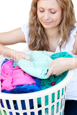 Attractive woman doing laundry
