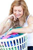 Smiling woman doing laundry