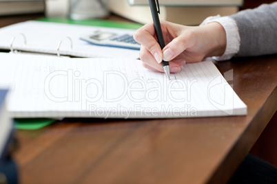 Close-up of a female student doing her homework