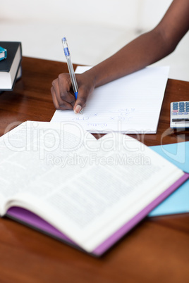 Close-up of a teen girl doing her homework