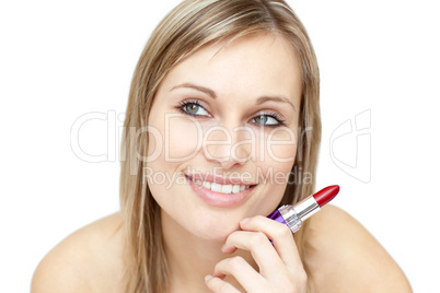 Attractive woman holding red lipstick