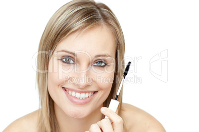 Beautiful woman holding a mascara