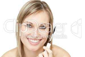 Beautiful woman holding a mascara