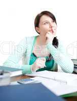Confident teen girl studying at her desk