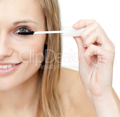 Close-up of a woman putting mascara