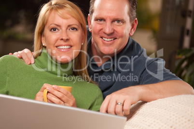 Handsome Couple Using Laptop