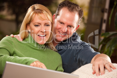 Handsome Couple Using Laptop