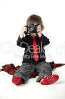Little boy with camera