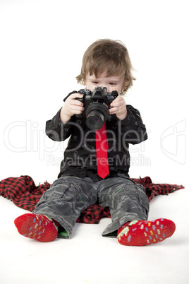 Little boy with camera