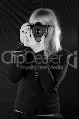 Blond lady taking pictures