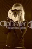 Blond lady taking pictures