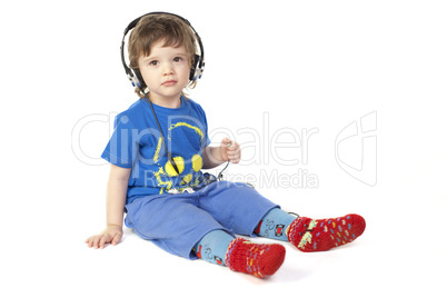 Little boy listening to the music