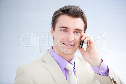 Confident businessman talking on phone