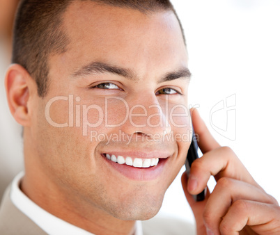 Handsome businessman talking on phone