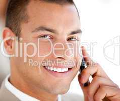 Handsome businessman talking on phone