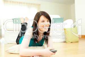 Jolly woman watching television