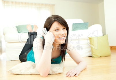 Positive woman watching television