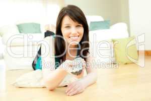 Brunette woman watching television