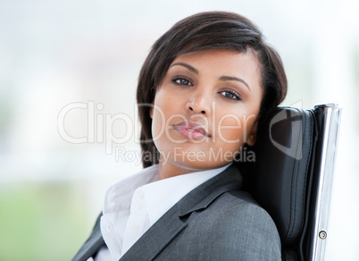 Portrait of a brunette business woman at work
