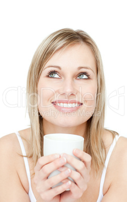 Portrait of a young woman drinking cofee
