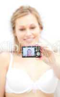 Beautiful woman taking a picture of herself