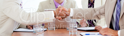 Two business people closing a deal