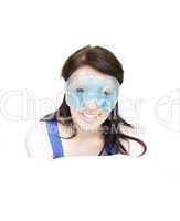Joyful woman with an eye gel mask