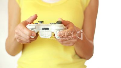 Close up of hands playing videogame