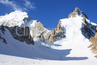 Great glacier and a group of climbers