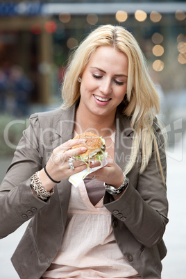 Having a hamburger