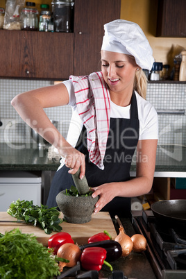 Using the pestle and mortar