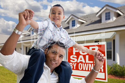 Hispanic Father and Son with For Sale By Owner Sign