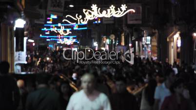 Crowded street at night.