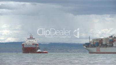 Two container ships pass in time lapse