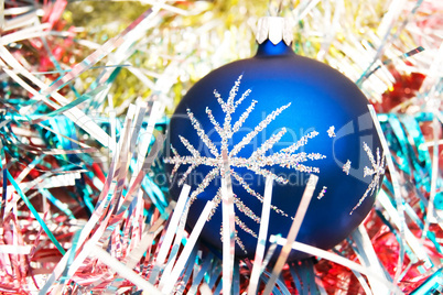 Blue christmas ball on the shiny decoration